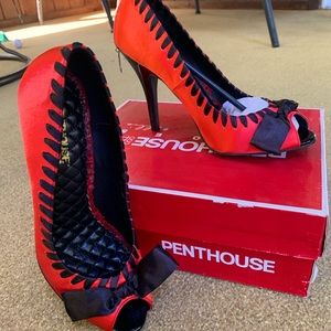 Penthouse Red peep toe heels.